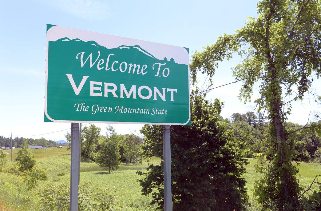 A welcome sign at the Vermont state line.