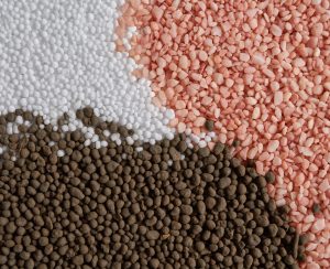 NPK : white ,black,pink,and colorful fertilizer for background. concept  :New years celebrate photo sets   for fertilizer or agriculture company .