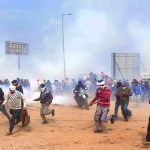 Indian police deploy tear gas against protesting farmers