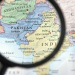 Pakistan on a map, seen through a magnifying glass
